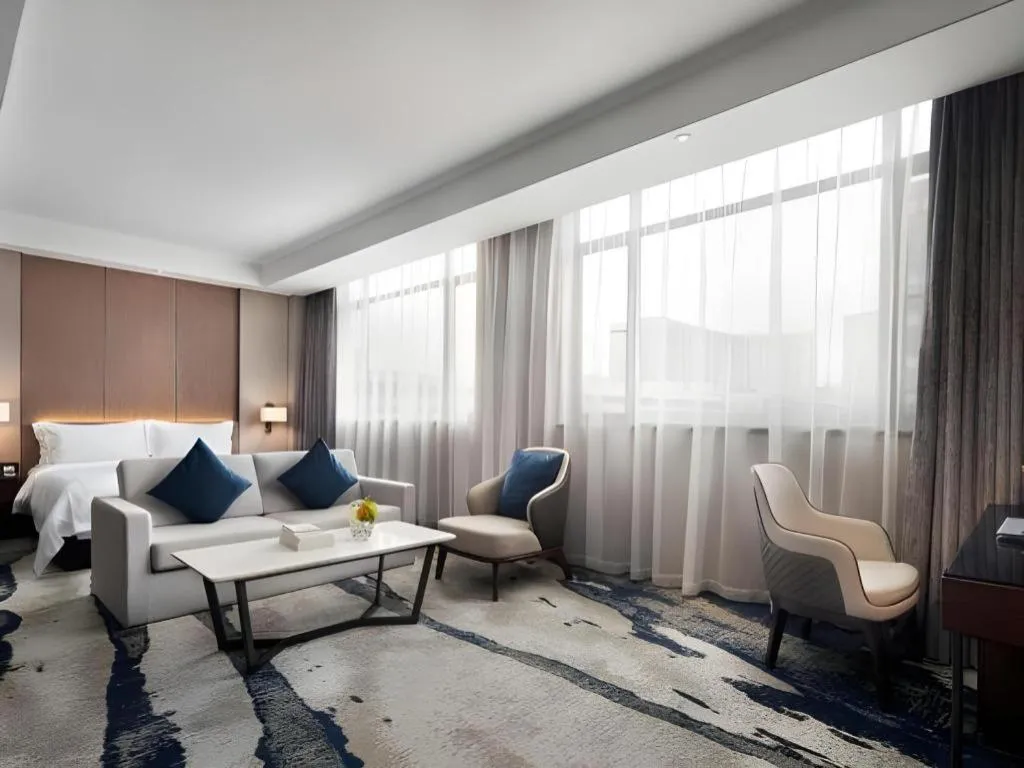 Bed in Zhonghao Boutique Hotel Dalang Business Center