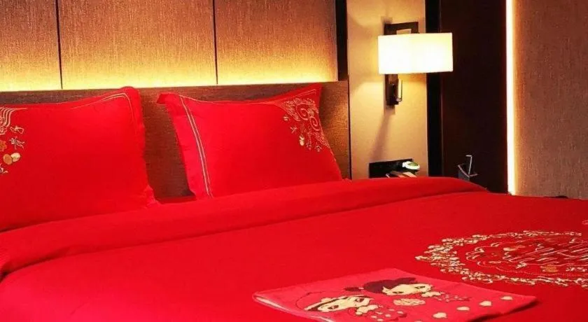 Bed in Zhonghao Boutique Hotel Dalang Business Center