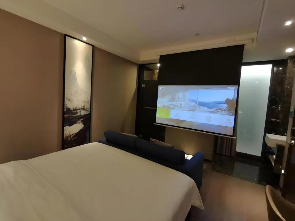 Bed in Zhonghao Boutique Hotel Dalang Business Center