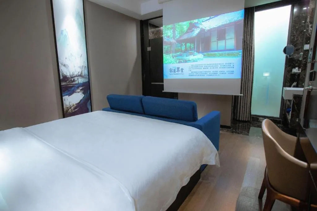 Bed in Zhonghao Boutique Hotel Dalang Business Center