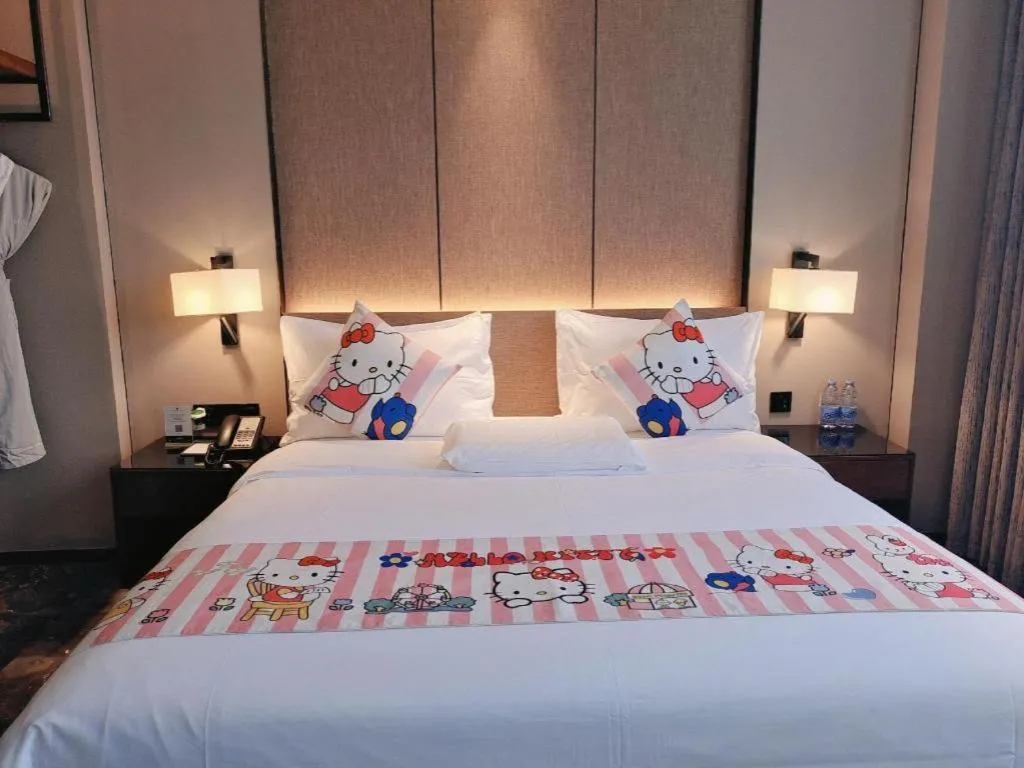 Bed in Zhonghao Boutique Hotel Dalang Business Center