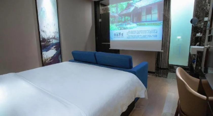 Bed in Zhonghao Boutique Hotel Dalang Business Center