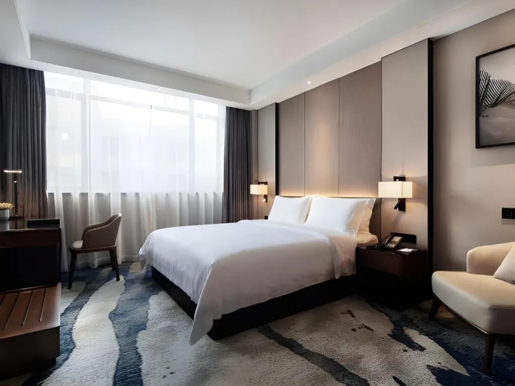 Bed in Zhonghao Boutique Hotel Dalang Business Center