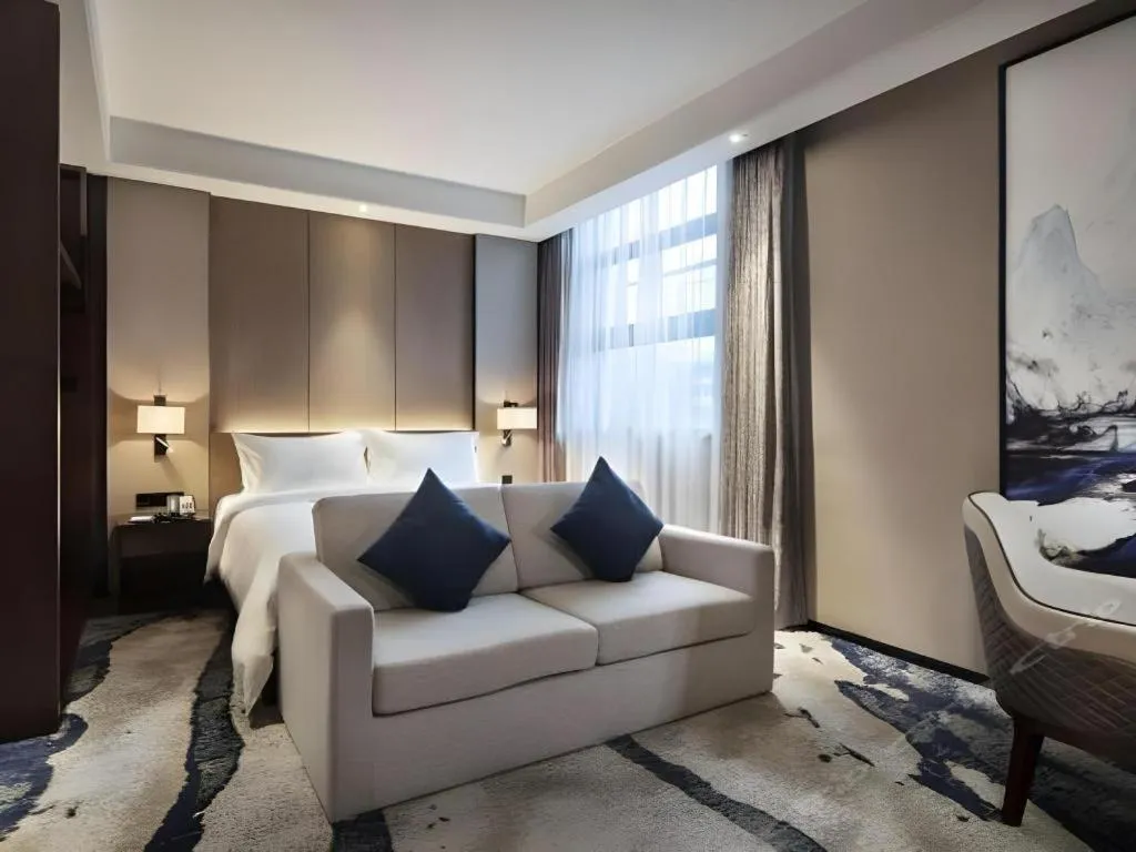 Bed in Zhonghao Boutique Hotel Dalang Business Center