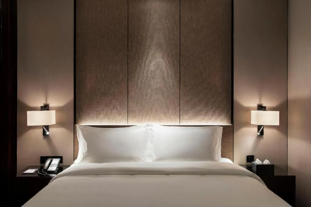 Bed in Zhonghao Boutique Hotel Dalang Business Center