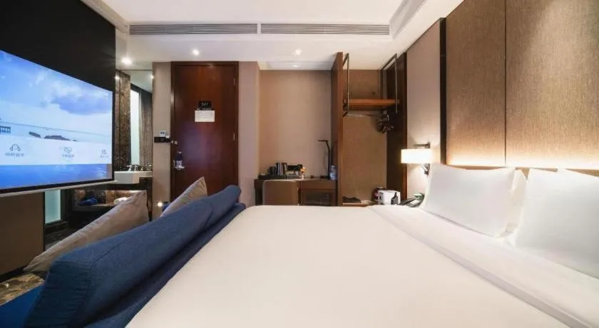Bed in Zhonghao Boutique Hotel Dalang Business Center