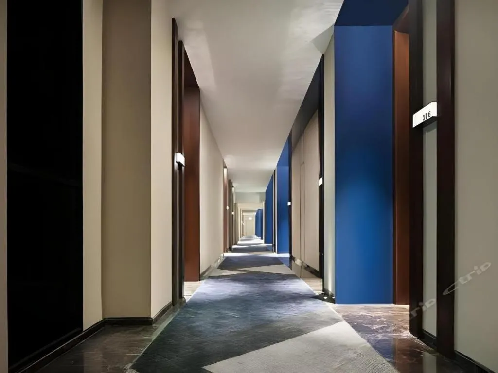 Bed in Zhonghao Boutique Hotel Dalang Business Center