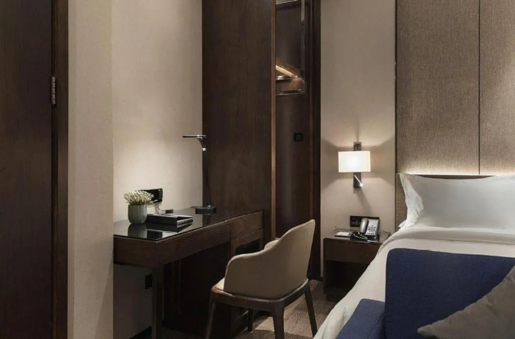 Bed in Zhonghao Boutique Hotel Dalang Business Center