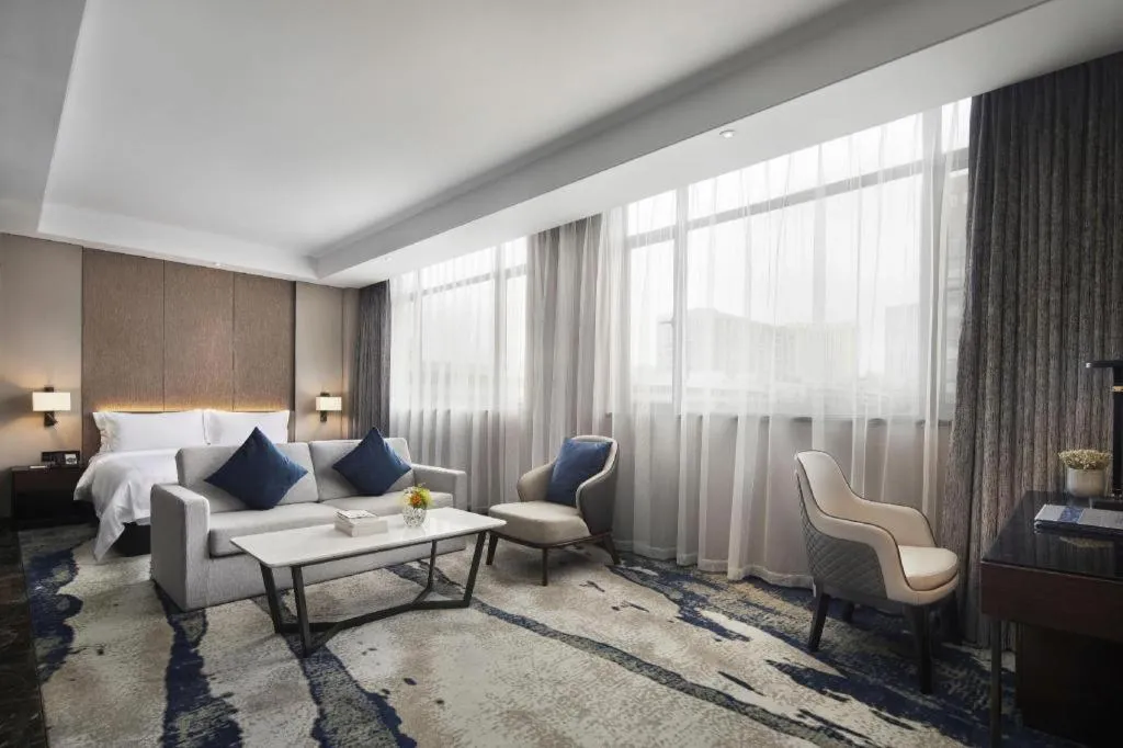 Bed in Zhonghao Boutique Hotel Dalang Business Center