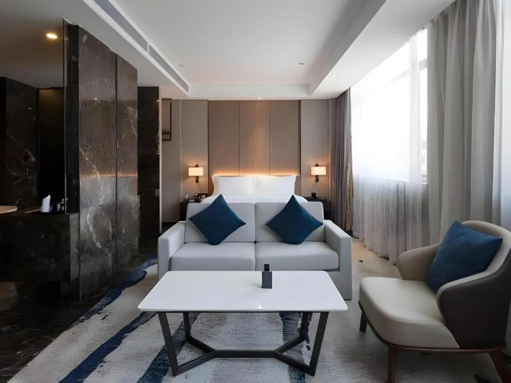 Bed in Zhonghao Boutique Hotel Dalang Business Center