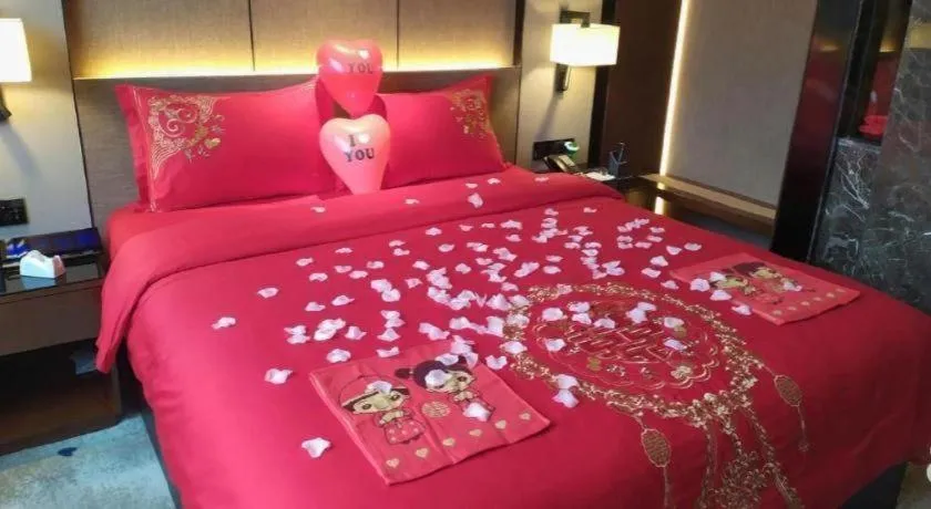 Bed in Zhonghao Boutique Hotel Dalang Business Center