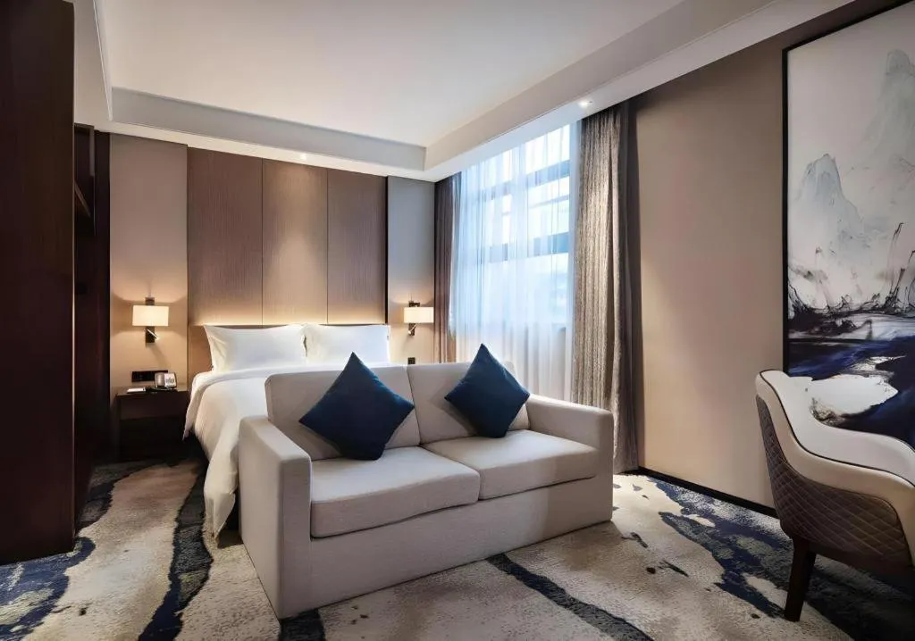 Bed in Zhonghao Boutique Hotel Dalang Business Center