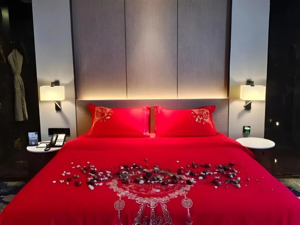 Bed in Zhonghao Boutique Hotel Dalang Business Center