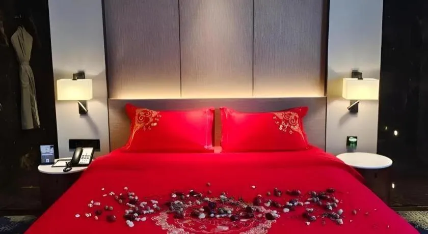 Bed in Zhonghao Boutique Hotel Dalang Business Center