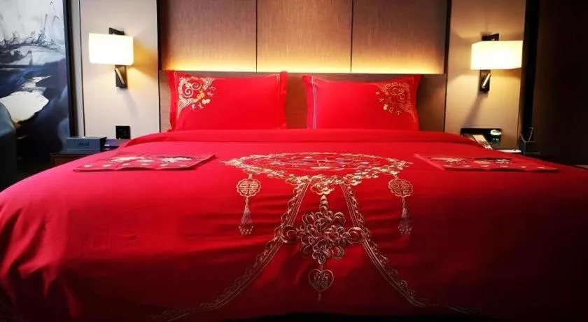 Bed in Zhonghao Boutique Hotel Dalang Business Center