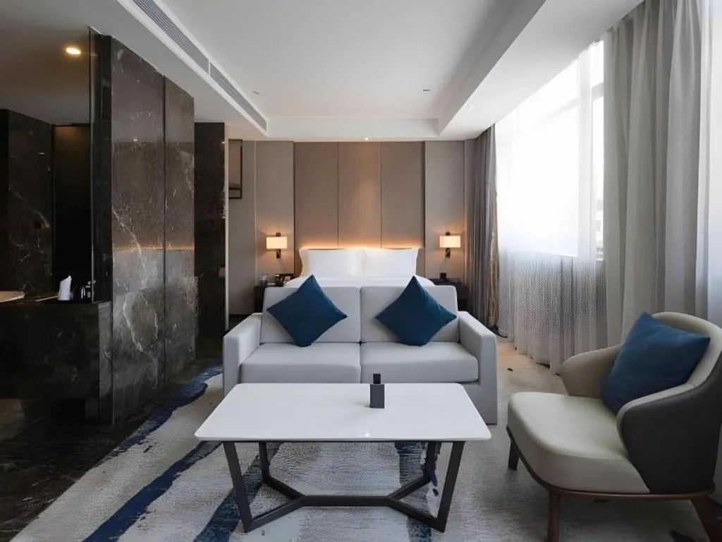 Bed in Zhonghao Boutique Hotel Dalang Business Center