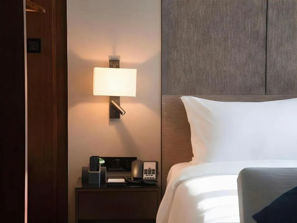 Bed in Zhonghao Boutique Hotel Dalang Business Center