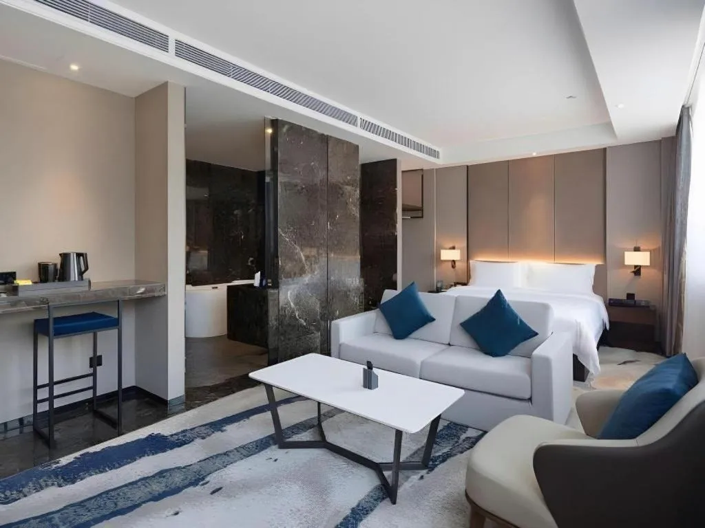 Bed in Zhonghao Boutique Hotel Dalang Business Center