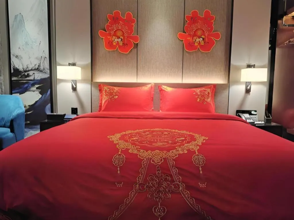 Bed in Zhonghao Boutique Hotel Dalang Business Center