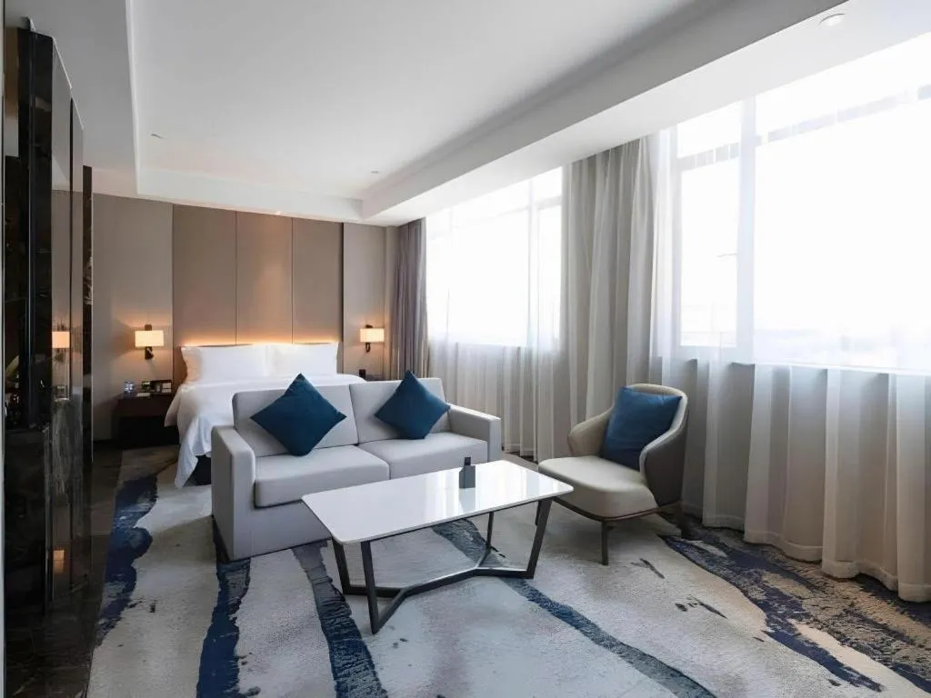 Bed in Zhonghao Boutique Hotel Dalang Business Center