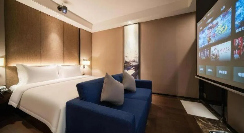 Bed in Zhonghao Boutique Hotel Dalang Business Center