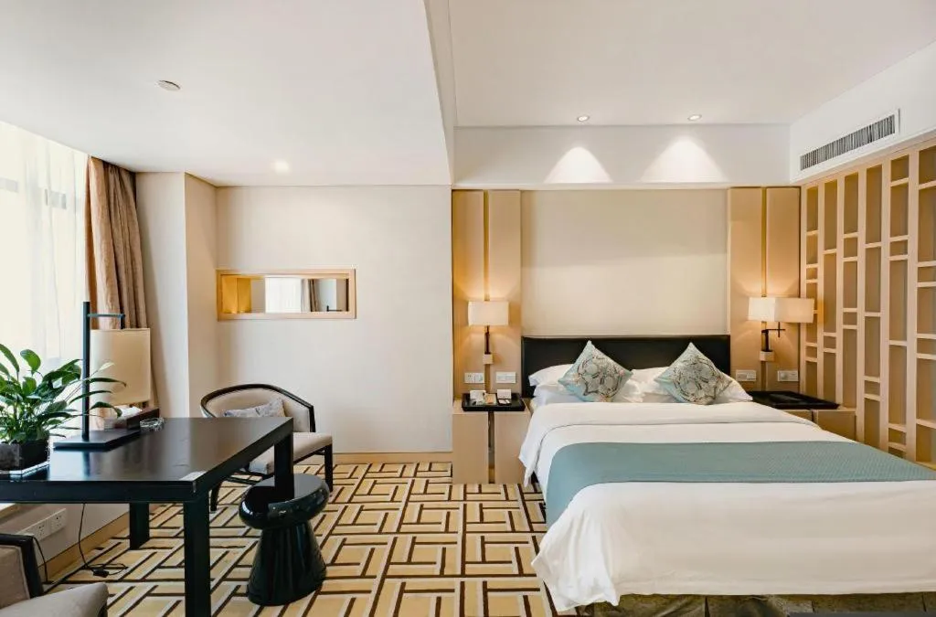 Bed in New Century Pujiang Hotel