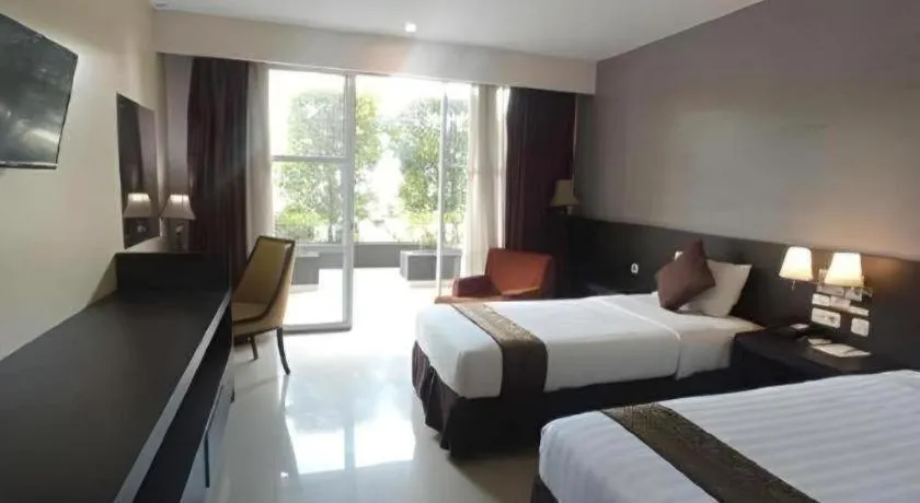 Bed in Grand Hawaii Hotel Pekanbaru