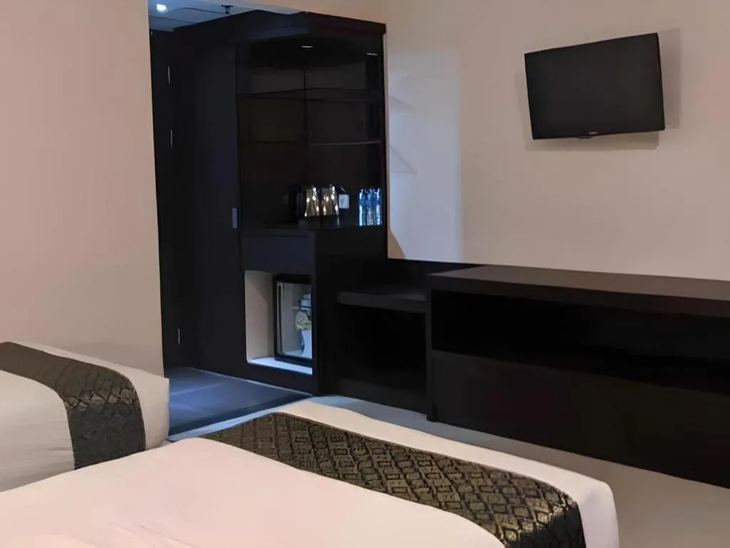 Bed in Grand Hawaii Hotel Pekanbaru