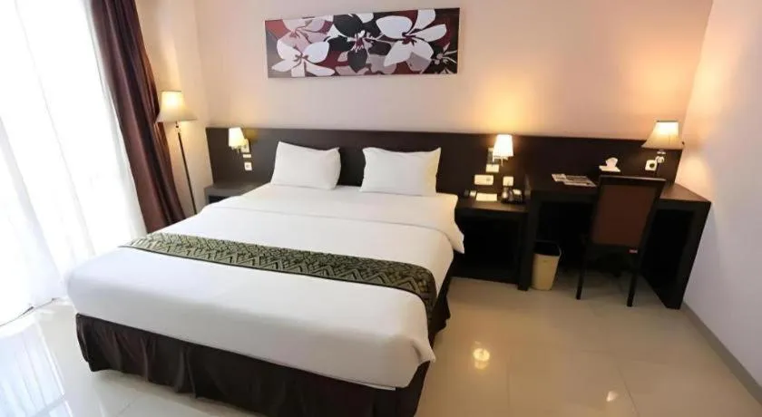 Bed in Grand Hawaii Hotel Pekanbaru