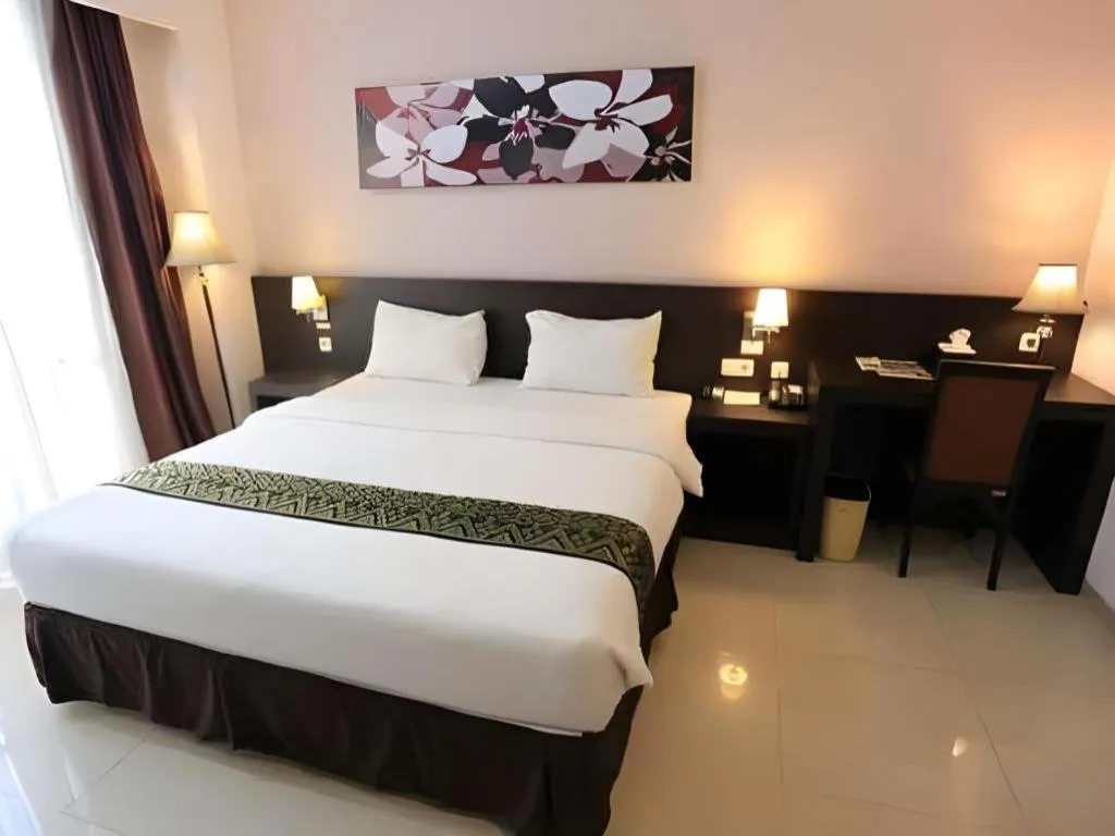 Bed in Grand Hawaii Hotel Pekanbaru
