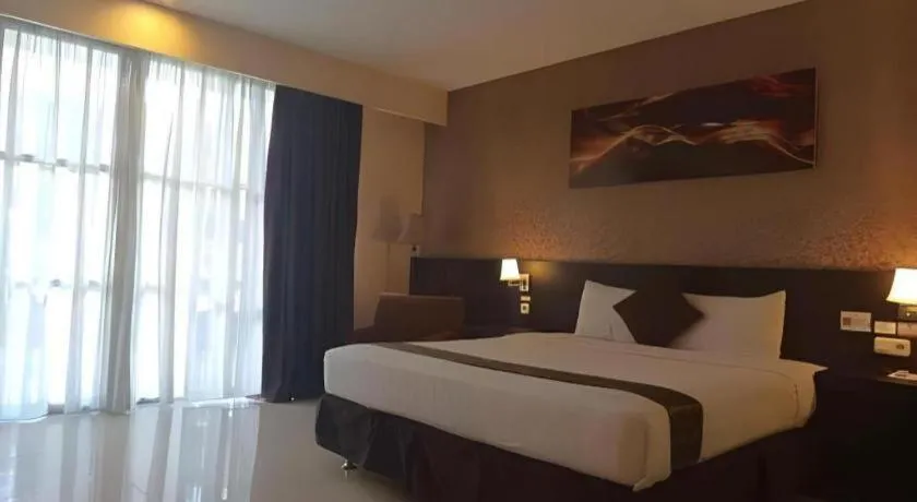 Bed in Grand Hawaii Hotel Pekanbaru