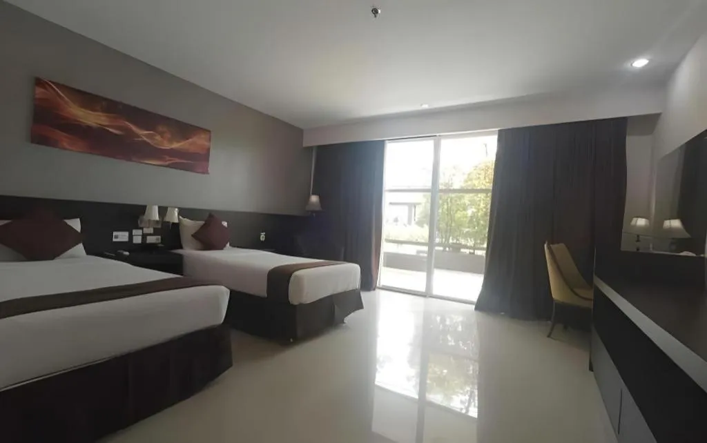Bed in Grand Hawaii Hotel Pekanbaru