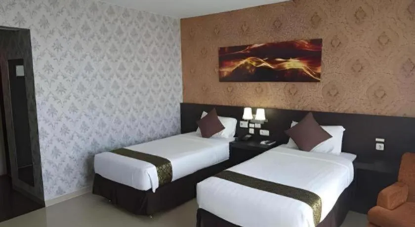 Bed in Grand Hawaii Hotel Pekanbaru