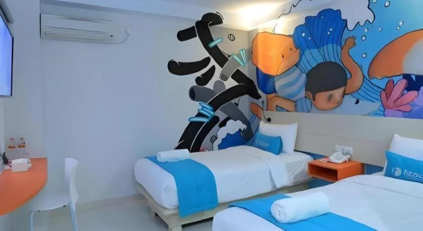 Bed in Fizz Hotel Lombok