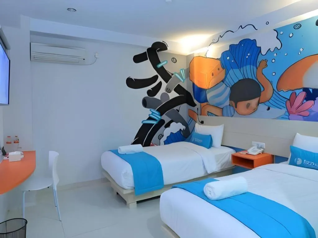 Bed in Fizz Hotel Lombok