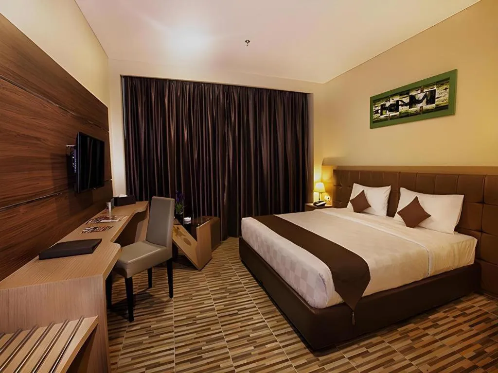 Bed in Asoka Luxury Hotel