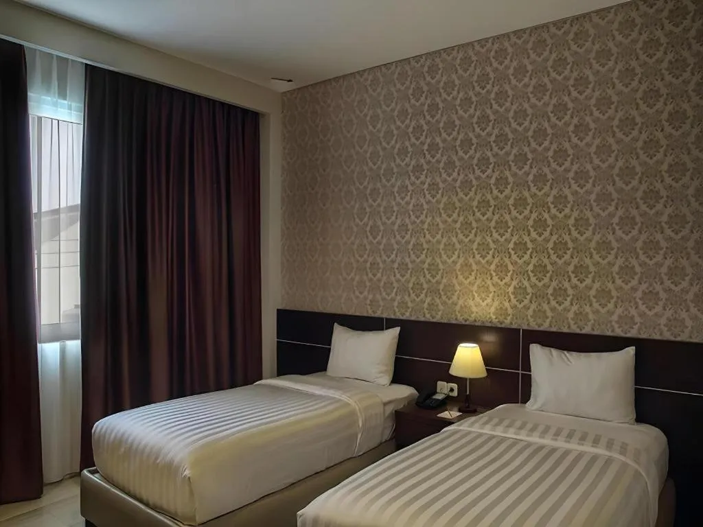 Bed in Asoka Luxury Hotel