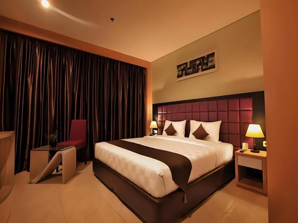 Bed in Asoka Luxury Hotel