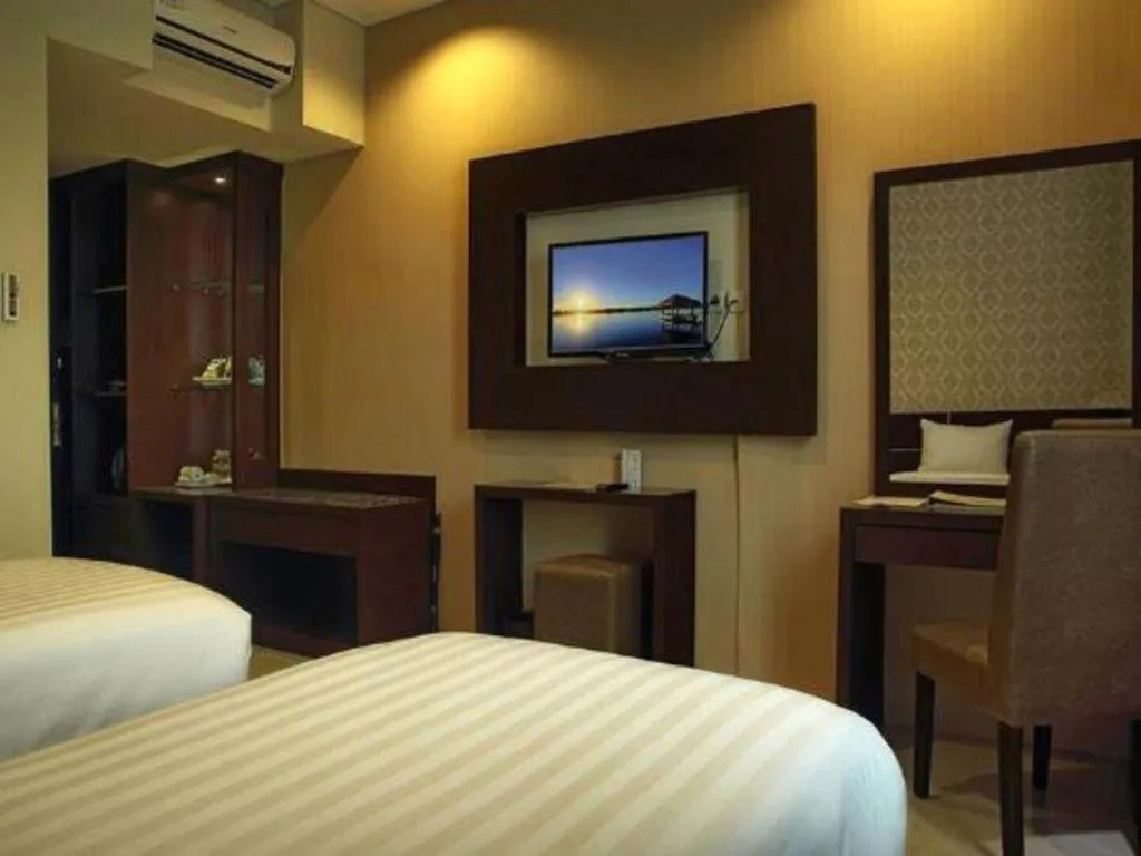 Bed in Asoka Luxury Hotel