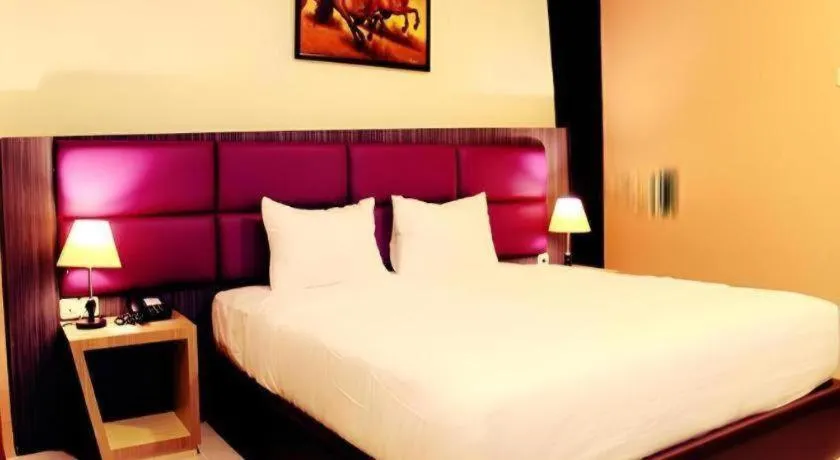 Bed in Asoka Luxury Hotel