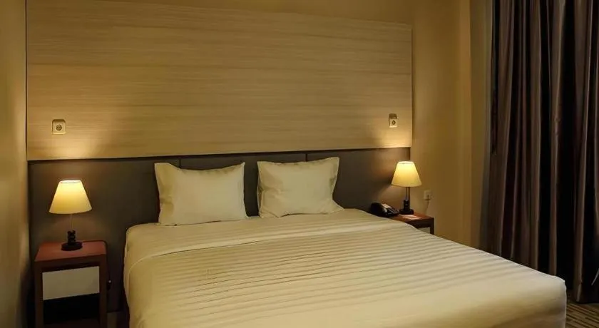 Bed in Asoka Luxury Hotel