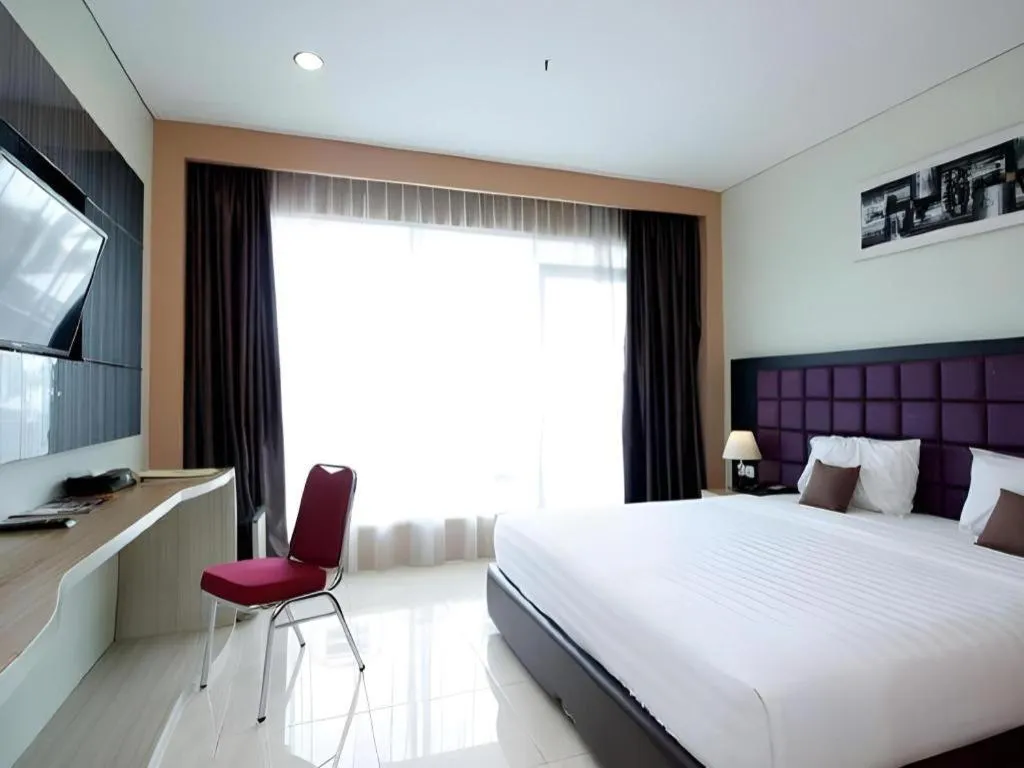 Bed in Asoka Luxury Hotel