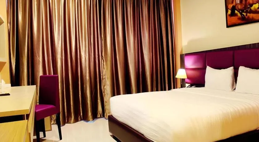 Bed in Asoka Luxury Hotel