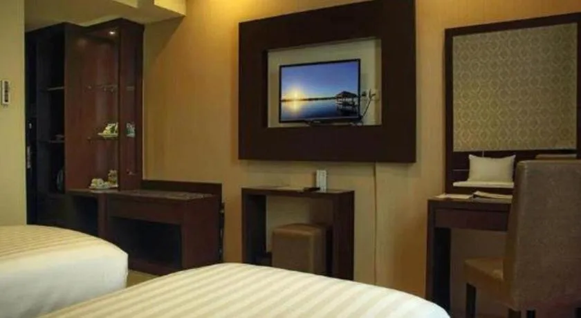 Bed in Asoka Luxury Hotel