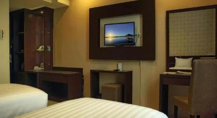 Bed in Asoka Luxury Hotel