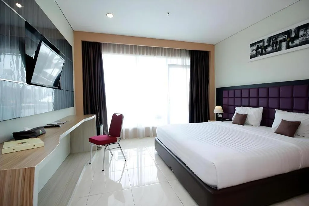 Bed in Asoka Luxury Hotel