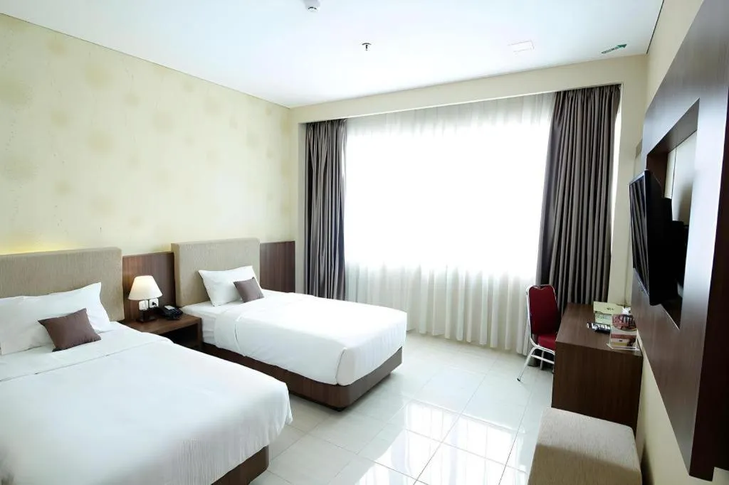 Bed in Asoka Luxury Hotel