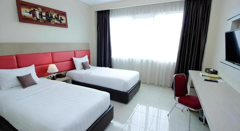 Bed in Asoka Luxury Hotel