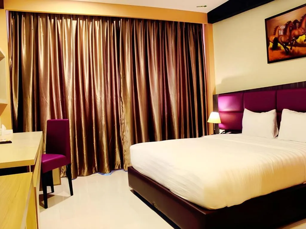 Bed in Asoka Luxury Hotel