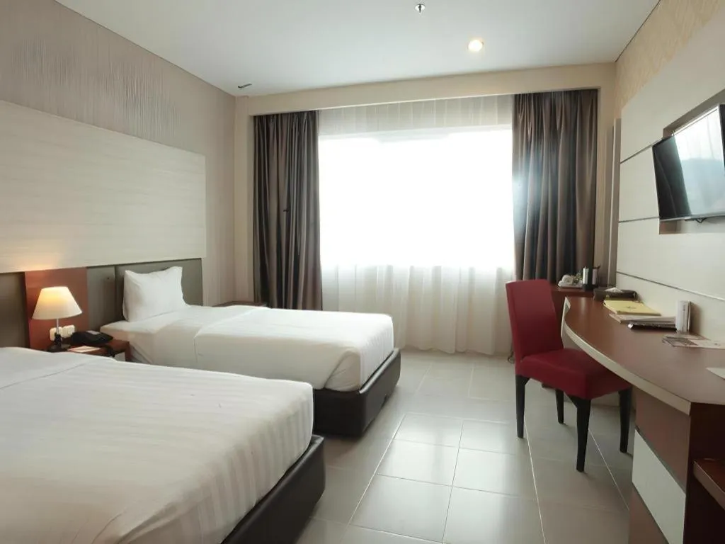 Bed in Asoka Luxury Hotel